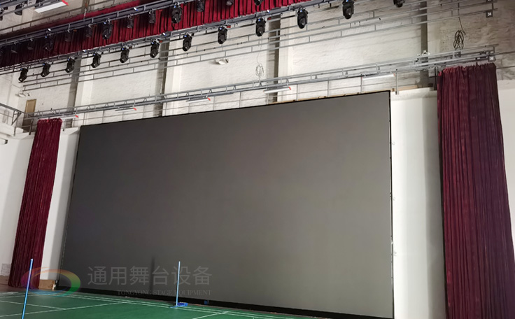 廣州黃花崗禮堂選擇通用舞臺！禮堂舞臺阻燃幕布、吊桿、舞臺燈光項目圓滿竣工！